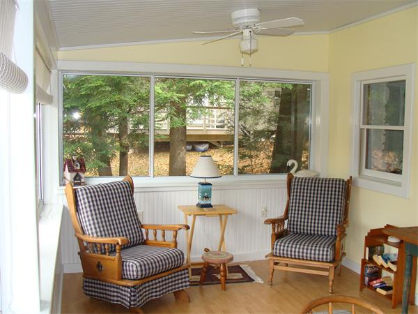 197 South Chesterfield Road Goshen, MA 01096 - Photo 7 of 29 a view of a dining room with furniture wooden floor and a chandelier