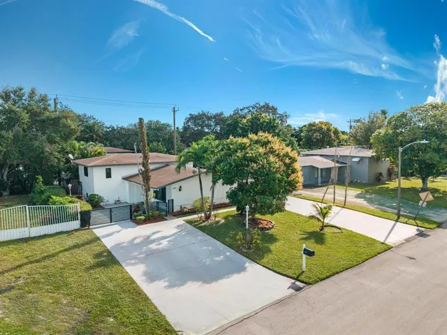 a view of a house with garden