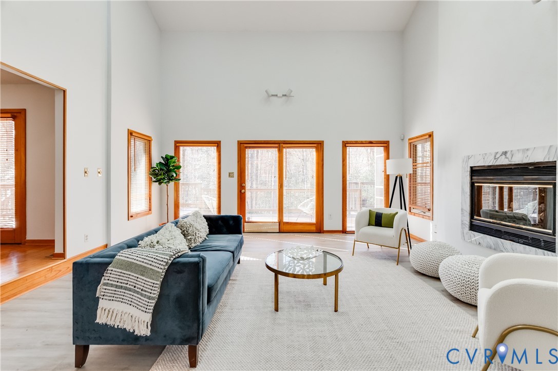14722 Swift Water Road Chesterfield, VA 23838 - Photo 12 of 50 a living room with furniture and a large window