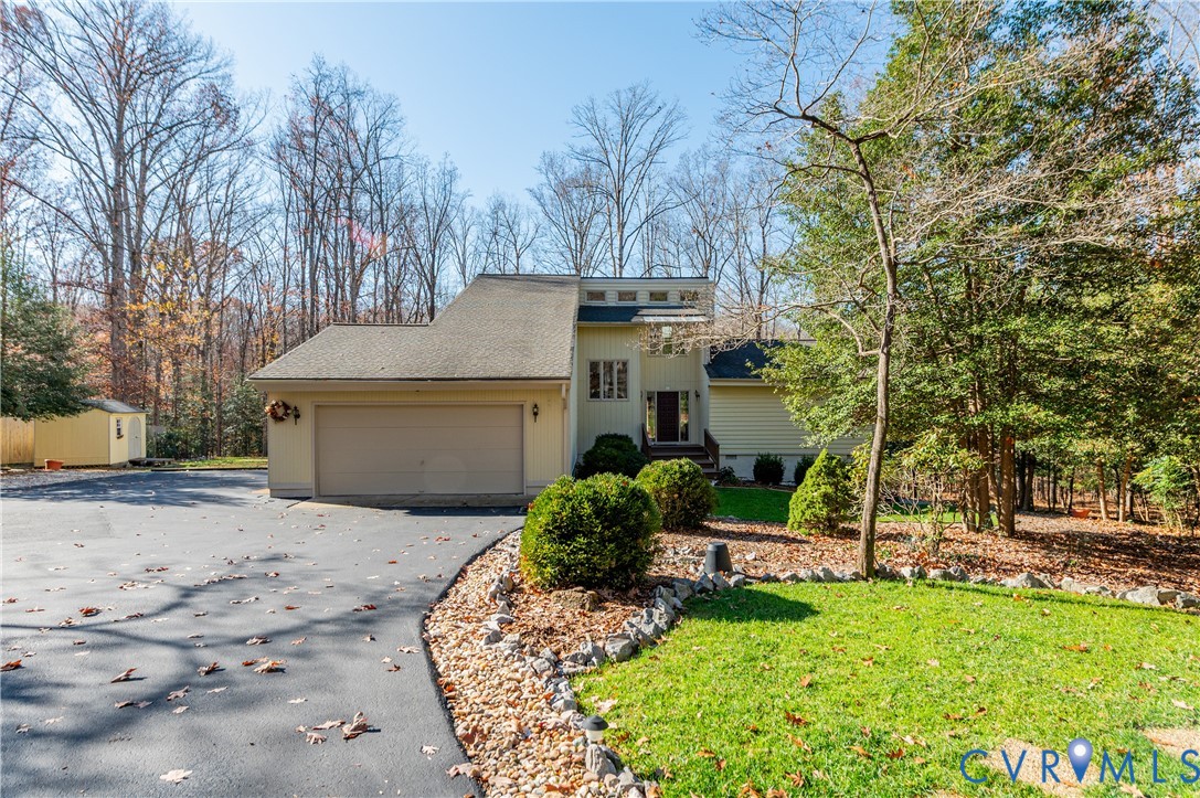 14722 Swift Water Road Chesterfield, VA 23838 - Photo 2 of 50 a view of a house with a yard