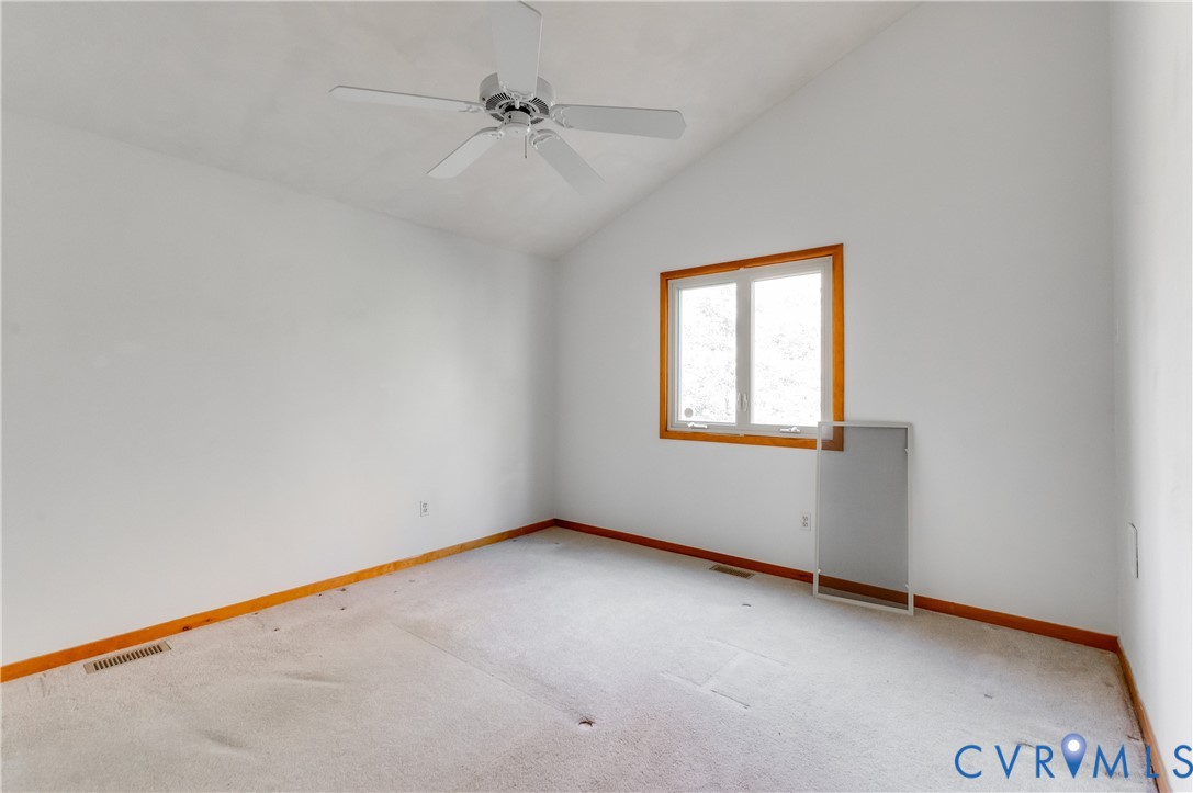 14722 Swift Water Road Chesterfield, VA 23838 - Photo 29 of 50 a view of an empty room with a window