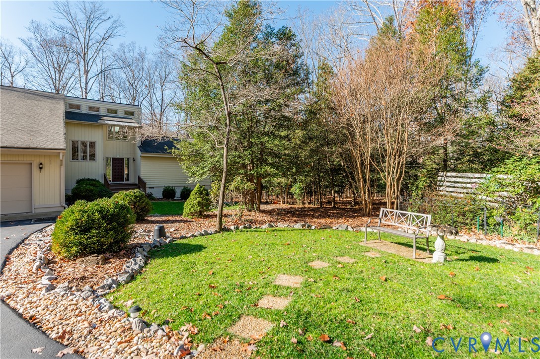 14722 Swift Water Road Chesterfield, VA 23838 - Photo 38 of 50 a view of a house with a yard and sitting area