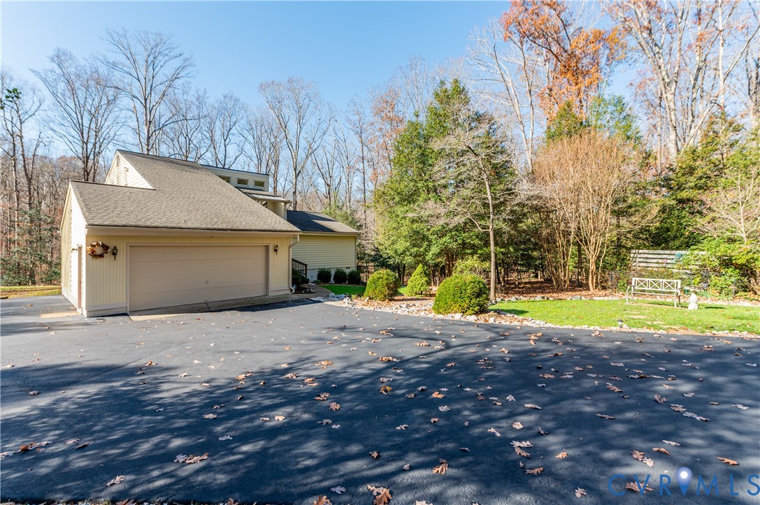 14722 Swift Water Road Chesterfield, VA 23838 - Photo 4 of 50 a view of backyard of house with green space