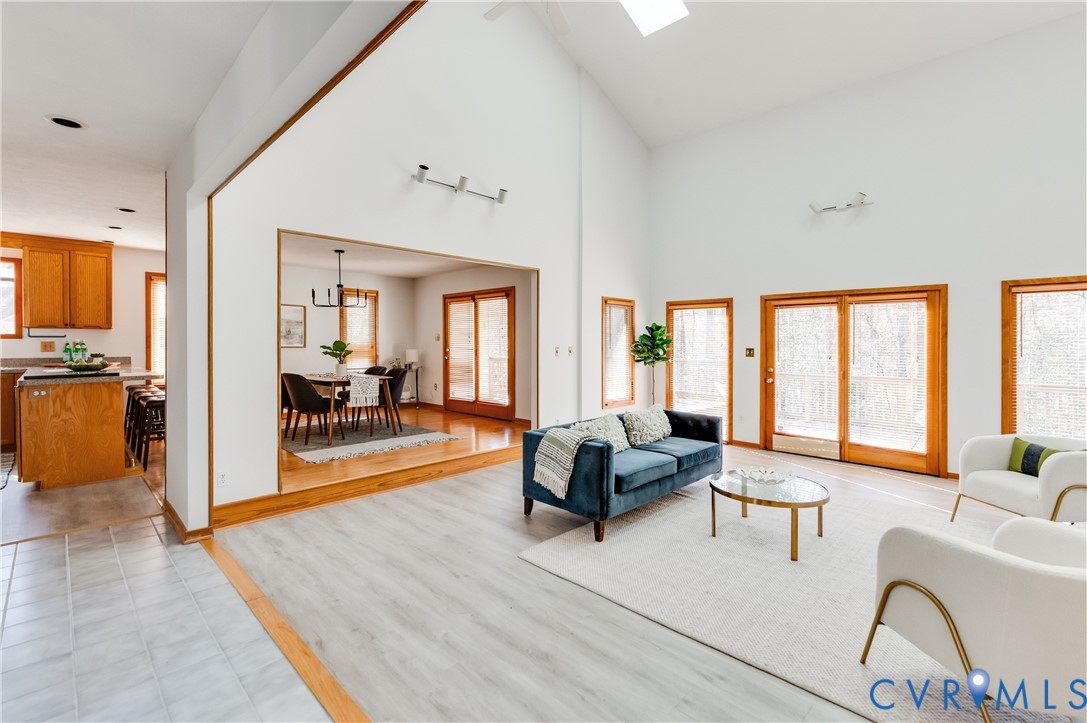 14722 Swift Water Road Chesterfield, VA 23838 - Photo 9 of 50 a living room with furniture and a large window