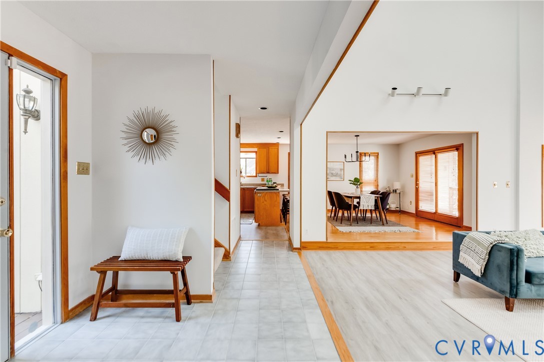 14722 Swift Water Road Chesterfield, VA 23838 - Photo 10 of 50 a view of a livingroom with furniture and a flat screen tv