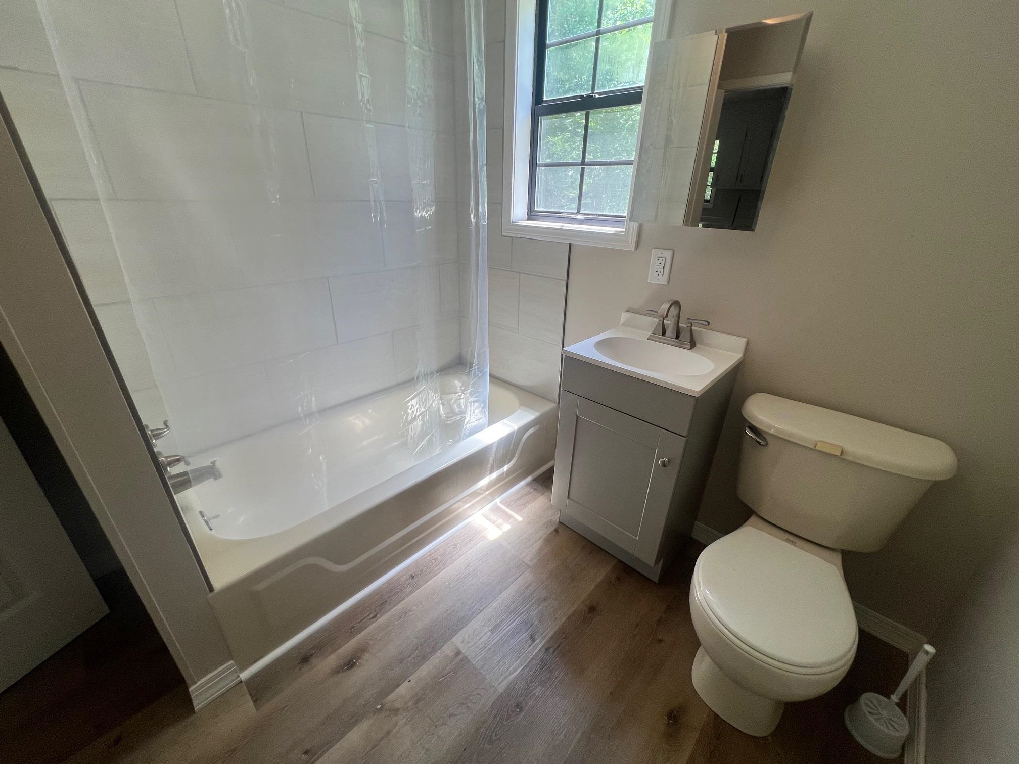90 Double Springs Loop Savannah, TN 38372 - Photo 15 of 31 a bathroom with a toilet sink and mirror