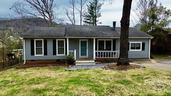 a house view with a garden space