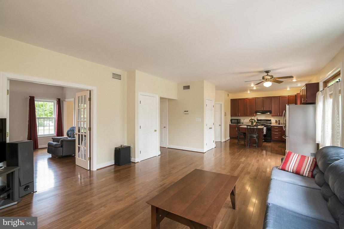 7824 Rocky Springs Road Frederick, MD 21702 - Photo 30 of 30 Living Room open floor plan leads into kitchen