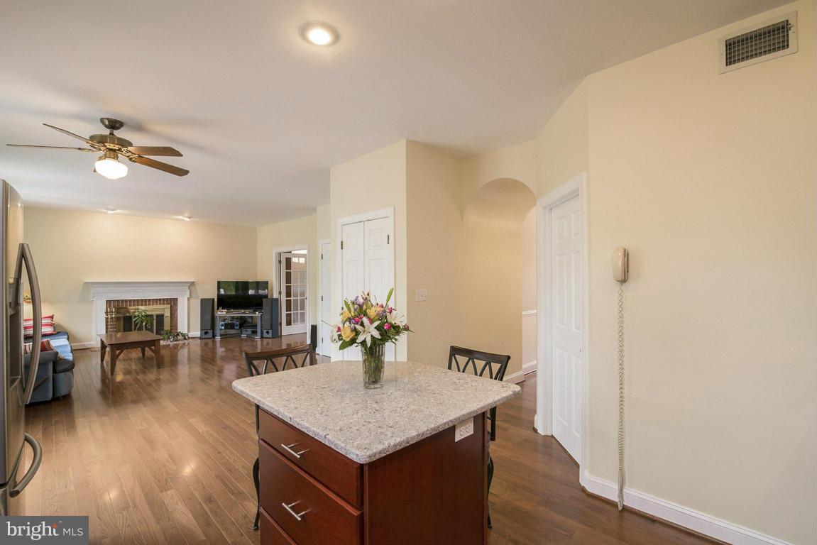 7824 Rocky Springs Road Frederick, MD 21702 - Photo 8 of 30 Kitchen flows into living room