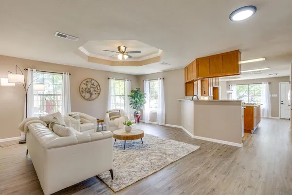 a living room with furniture and a window
