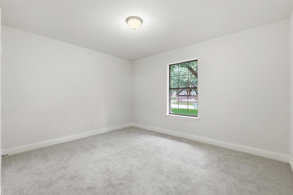 19 Timbergreen Circle Denton, TX 76205 - Photo 26 of 40 an empty room with a window