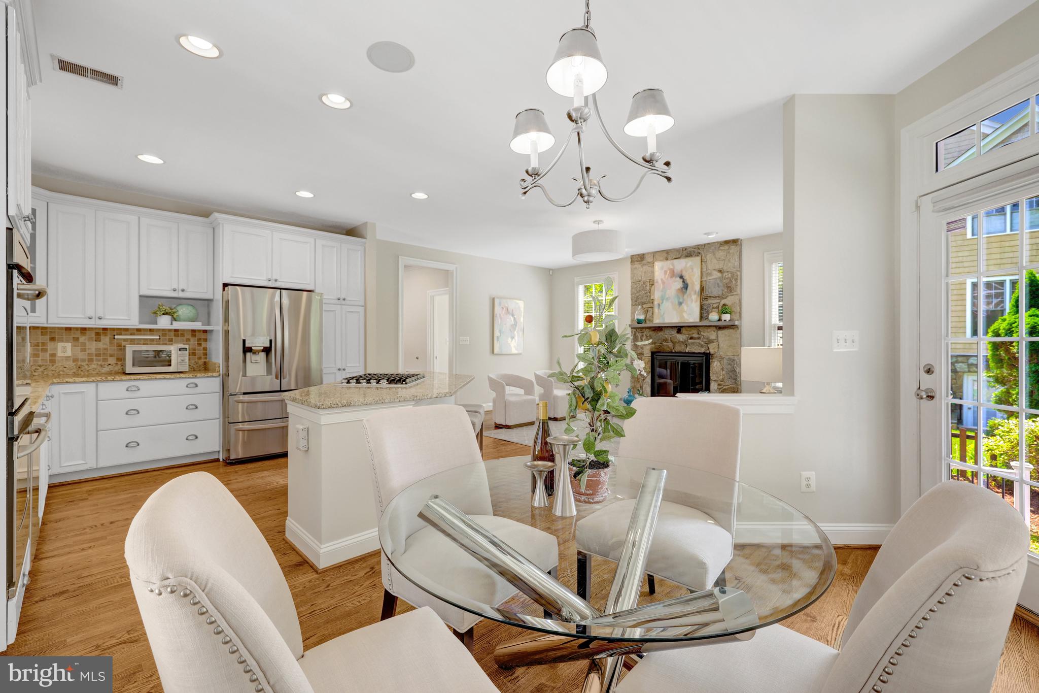 1519 Pathfinder Lane McLean, VA 22101 - Photo 22 of 54 a living room with fireplace furniture and a chandelier