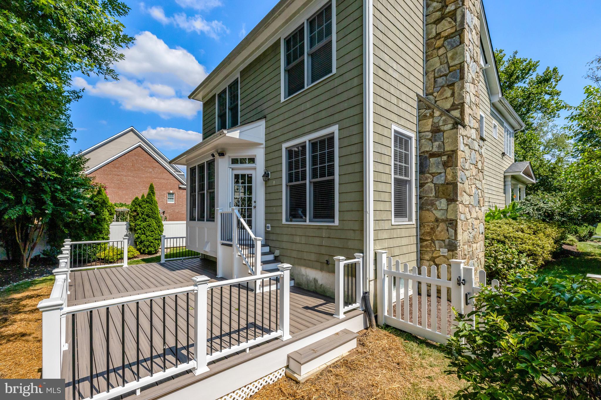 1519 Pathfinder Lane McLean, VA 22101 - Photo 23 of 54 a view of a house with wooden floor and a fence