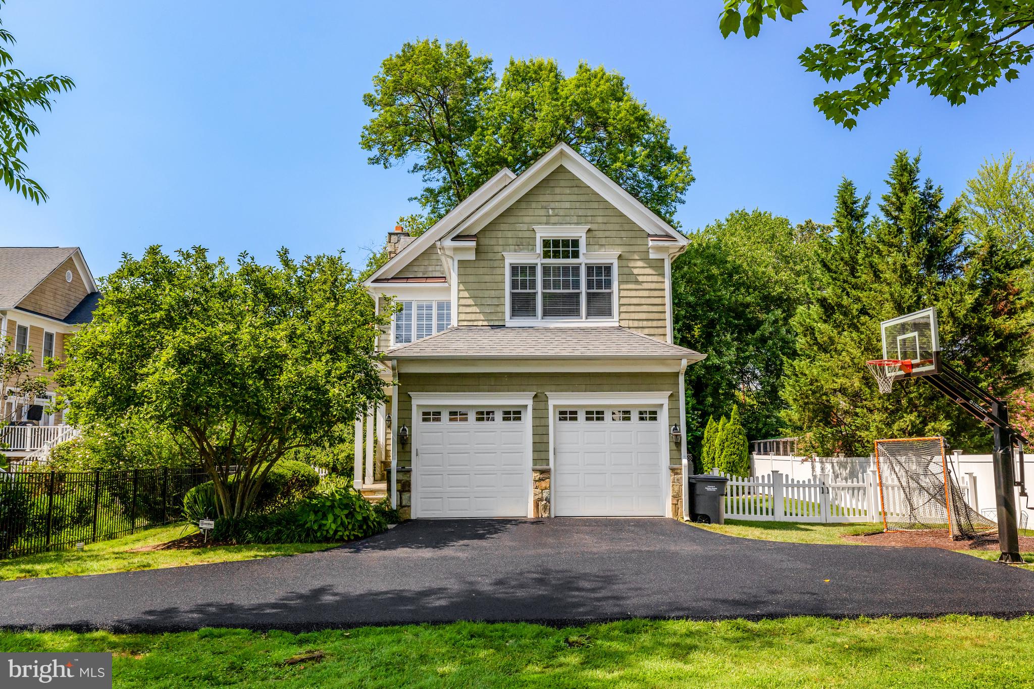 1519 Pathfinder Lane McLean, VA 22101 - Photo 4 of 54 a front view of a house with a yard