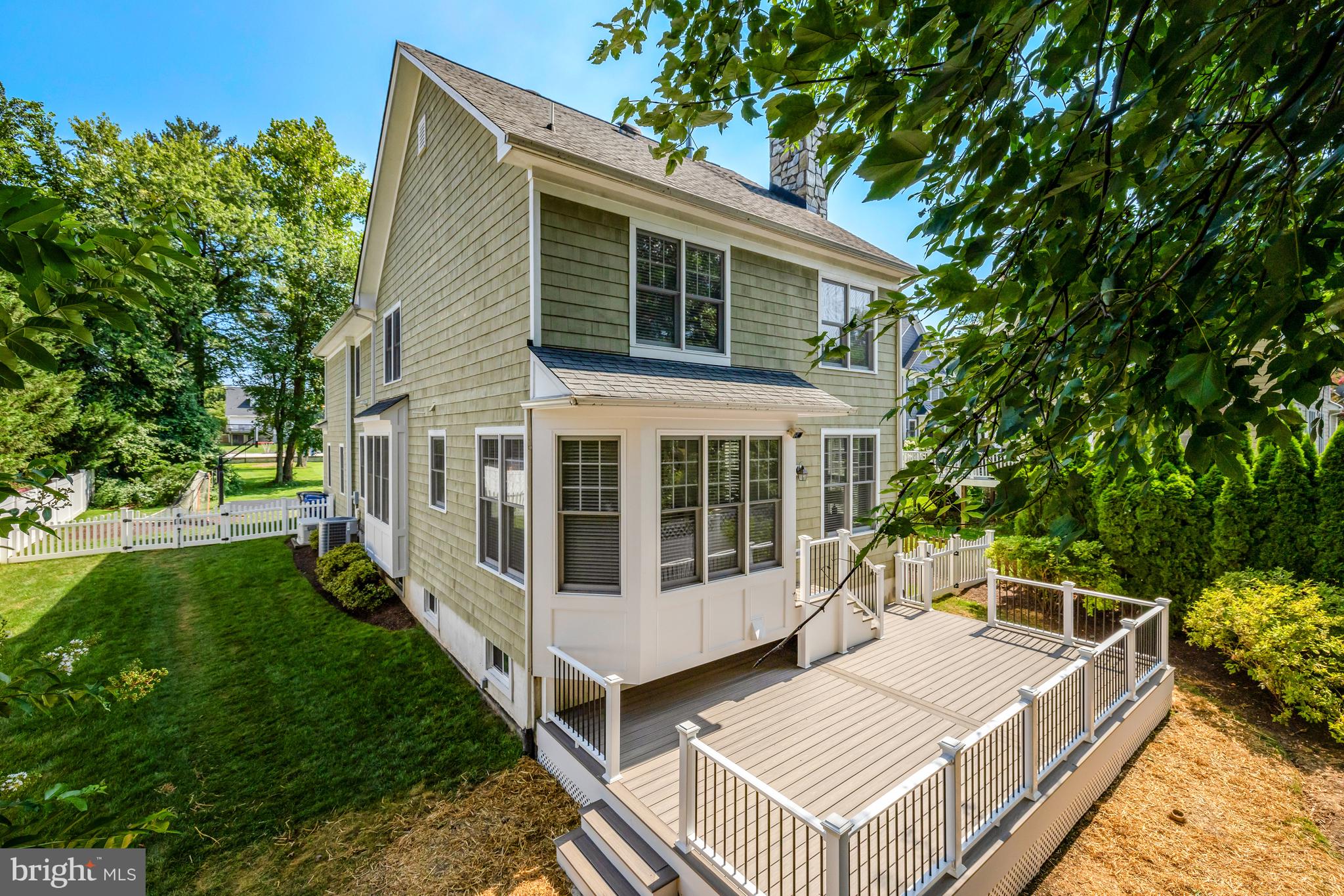 1519 Pathfinder Lane McLean, VA 22101 - Photo 49 of 54 a view of a house with backyard sitting area and garden