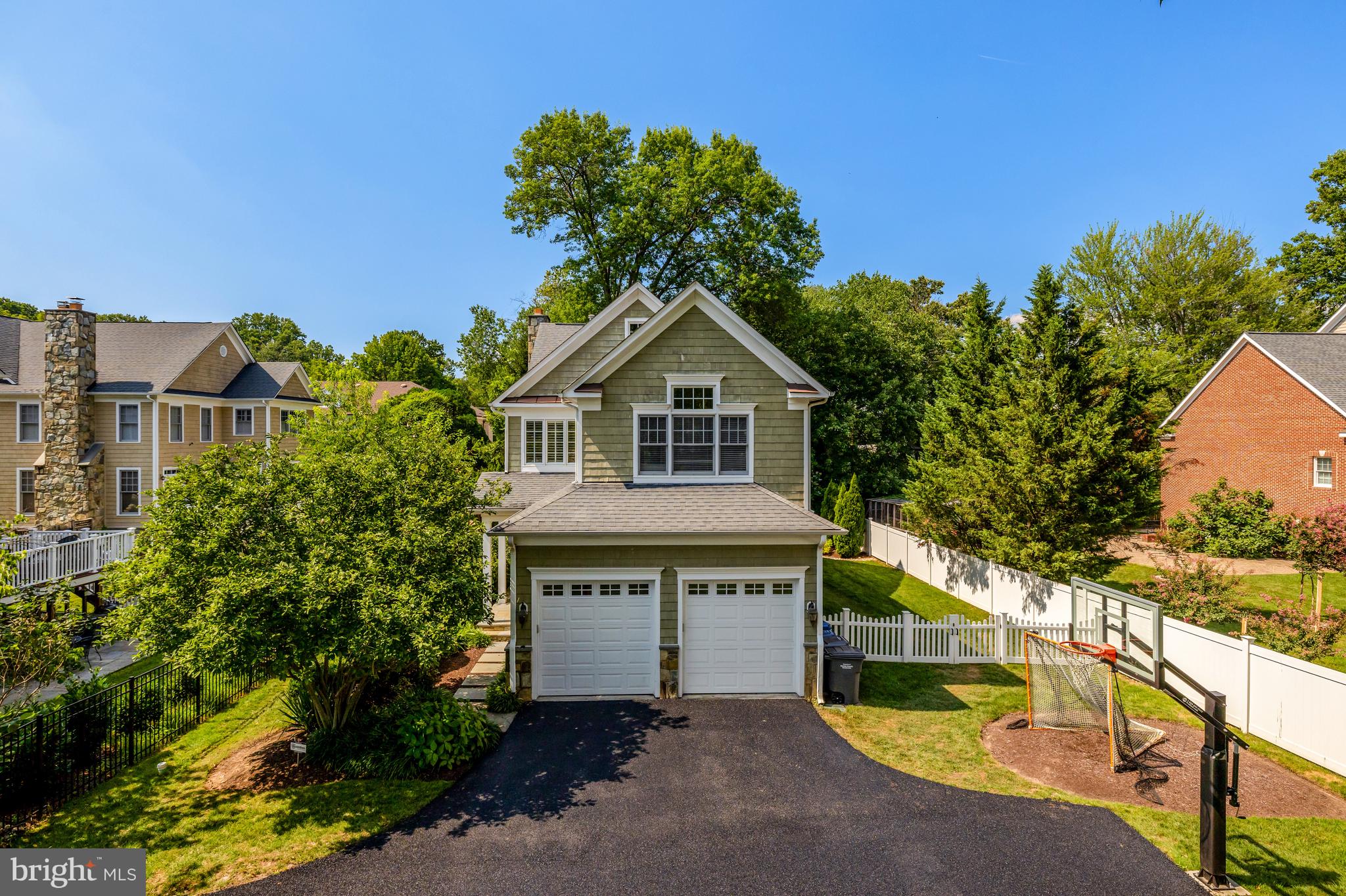 1519 Pathfinder Lane McLean, VA 22101 - Photo 5 of 54 a front view of a house with a yard