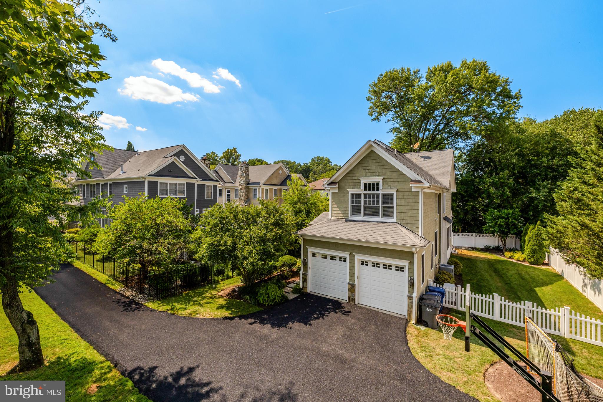 1519 Pathfinder Lane McLean, VA 22101 - Photo 6 of 54 a view of a house with a yard and potted plants