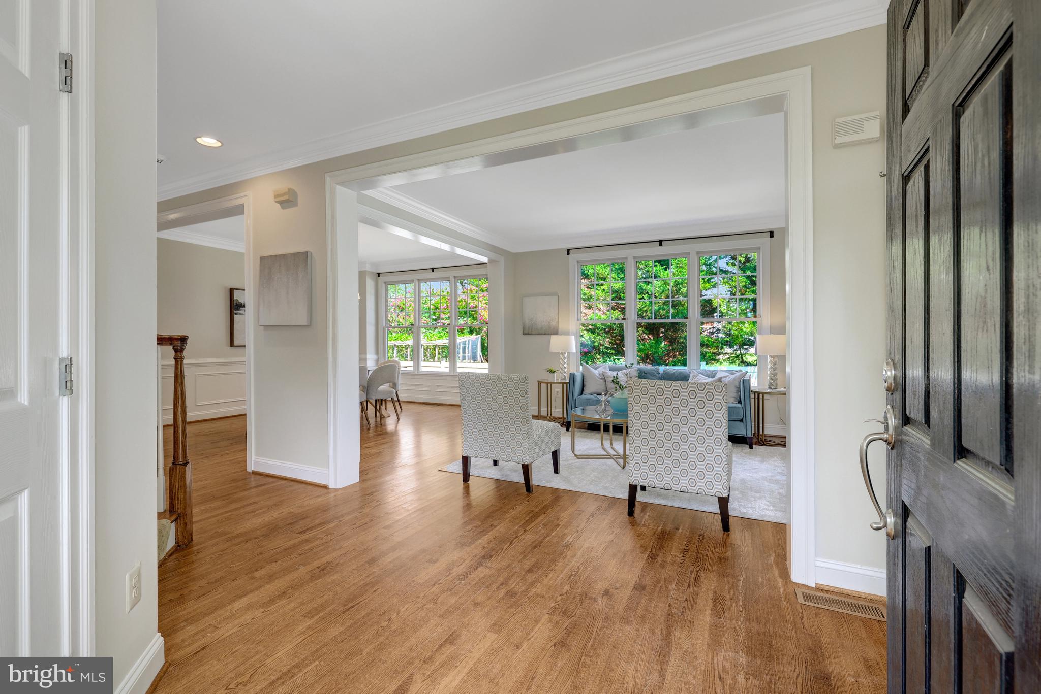 1519 Pathfinder Lane McLean, VA 22101 - Photo 9 of 54 a living room with furniture and a wooden floor