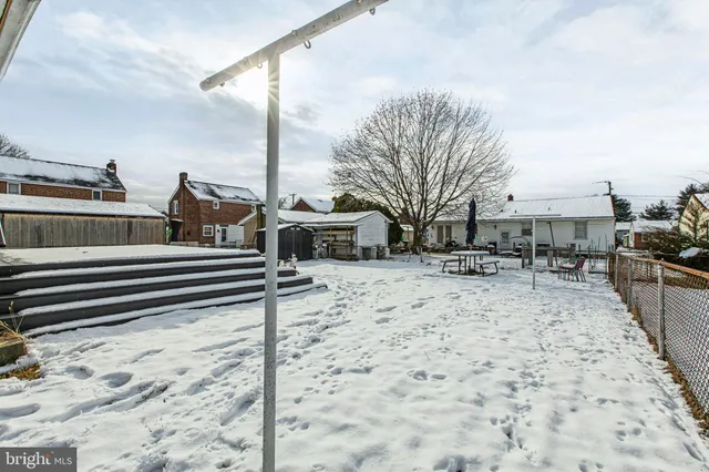 a front view of a house with a gate