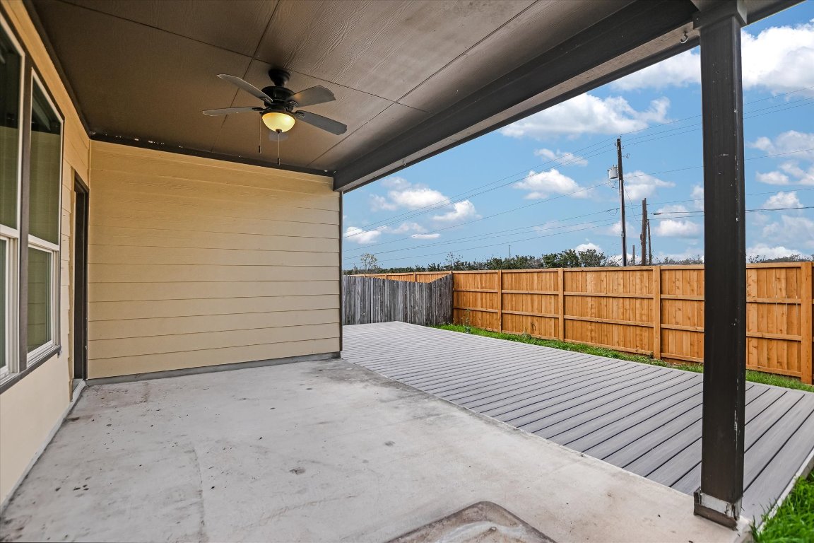 10020 Wading Pool Path Austin, TX 78748 - Photo 15 of 20 Fenced backyard featuring an upgraded patio with ceiling fan