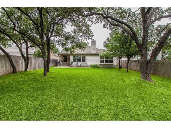 a house view with a garden space