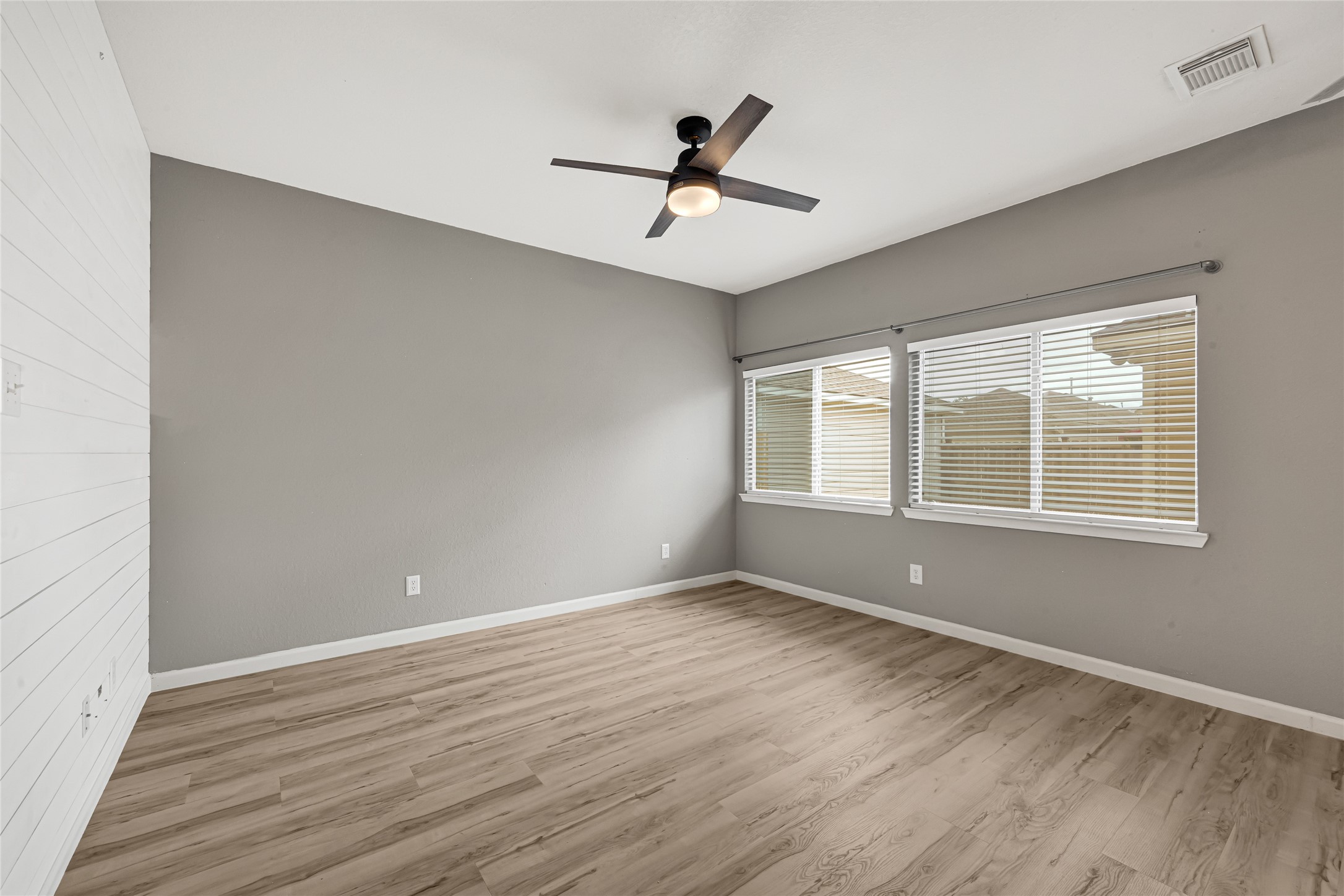 21831 Mossy Field Lane Spring, TX 77388 - Photo 11 of 26 wooden floor in an empty room with a window