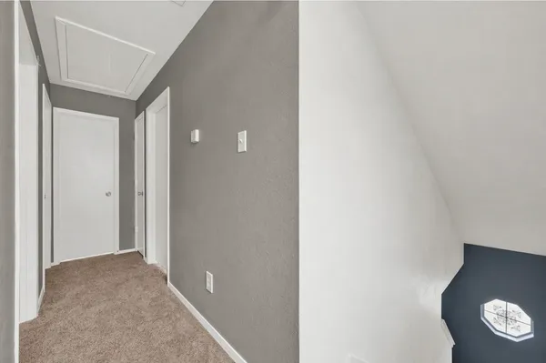 a view of a big room with carpet