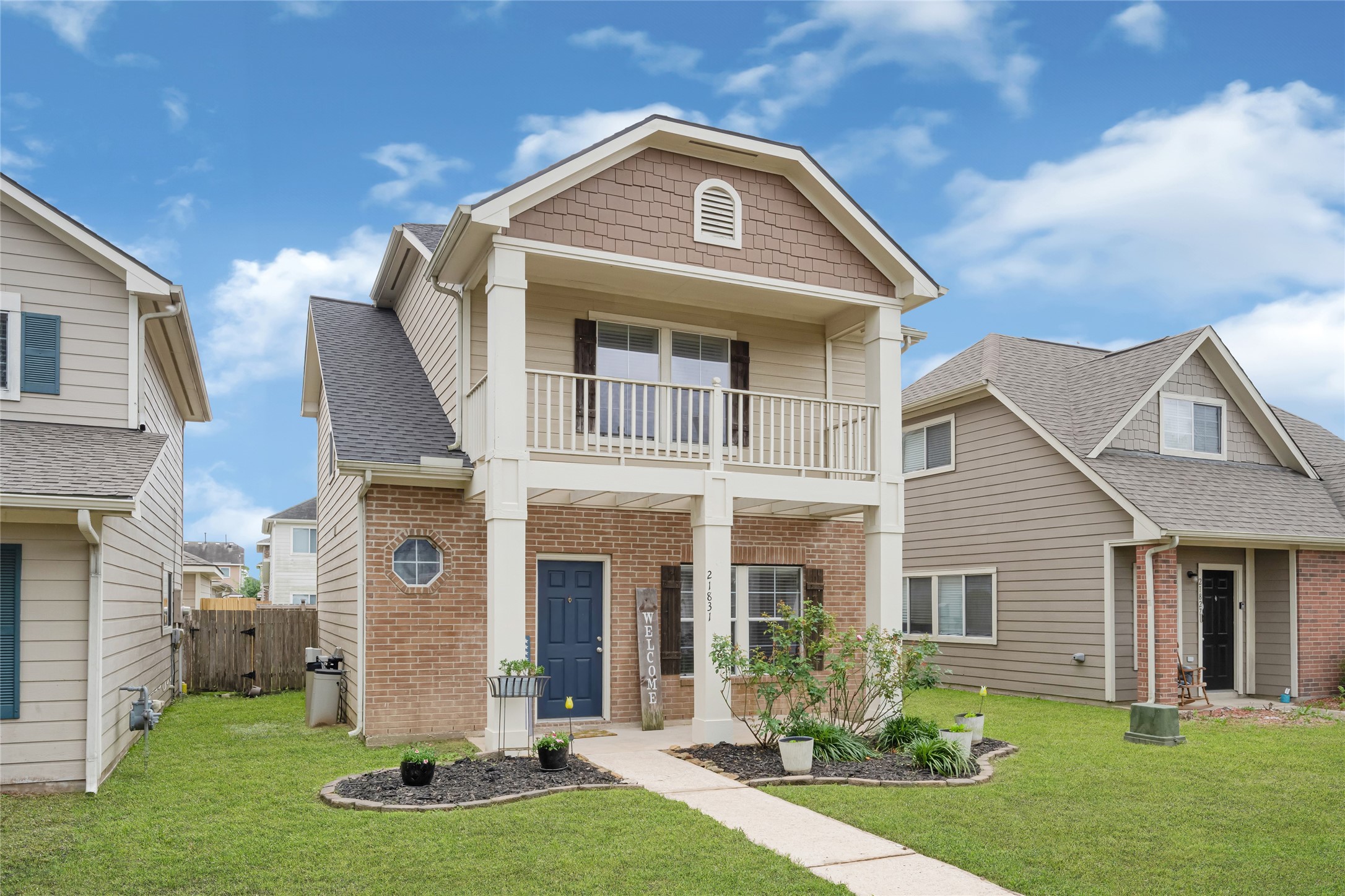 21831 Mossy Field Lane Spring, TX 77388 - Photo 2 of 26 a front view of a house with a yard