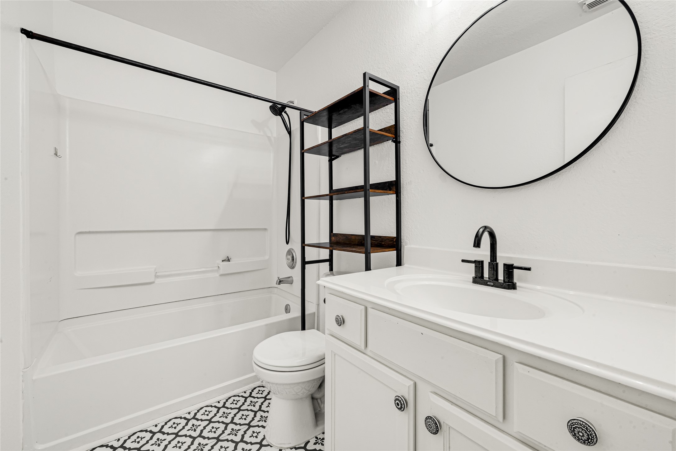 21831 Mossy Field Lane Spring, TX 77388 - Photo 21 of 26 a bathroom with a sink a toilet and a mirror