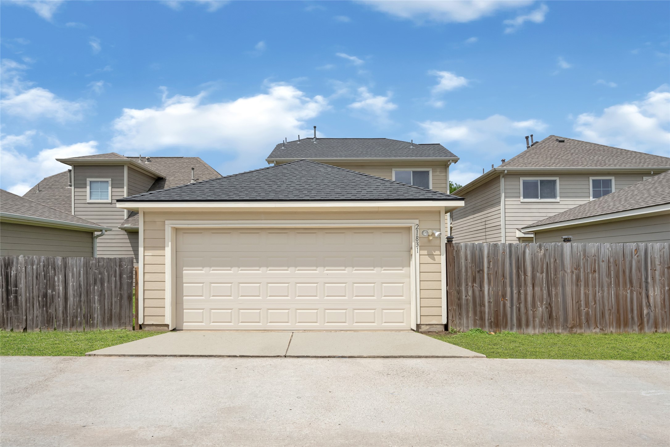 21831 Mossy Field Lane Spring, TX 77388 - Photo 26 of 26 a front view of a house with a yard and garage