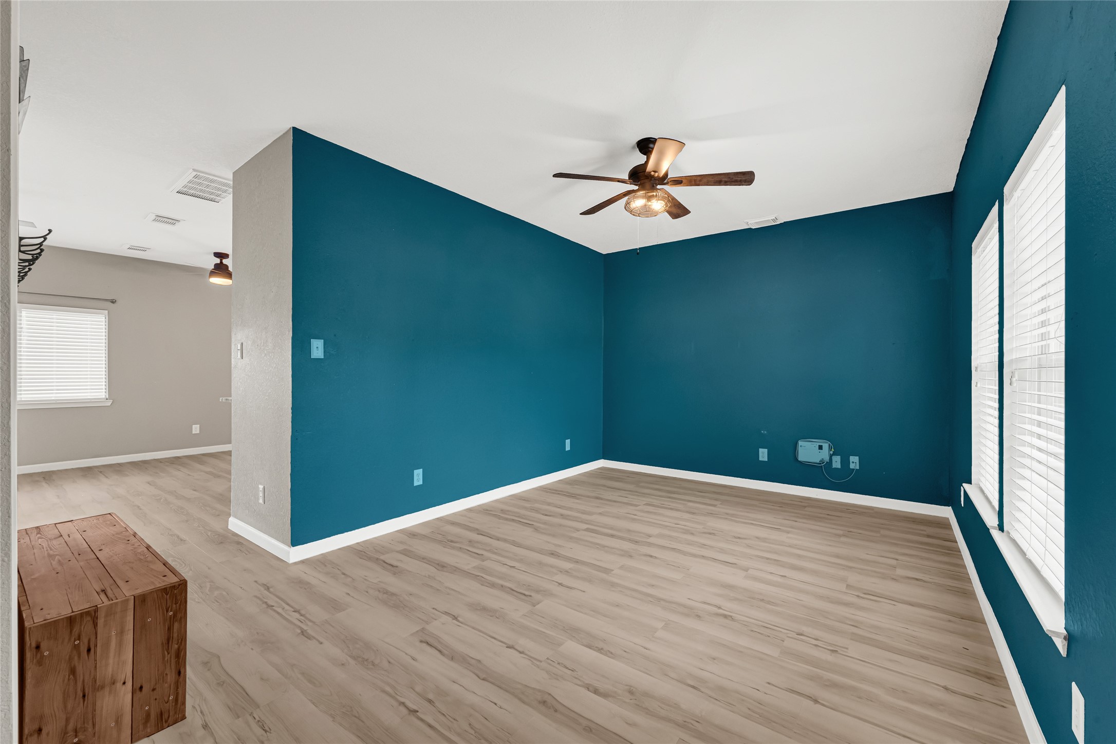 21831 Mossy Field Lane Spring, TX 77388 - Photo 5 of 26 a view of a big room with wooden floor and windows
