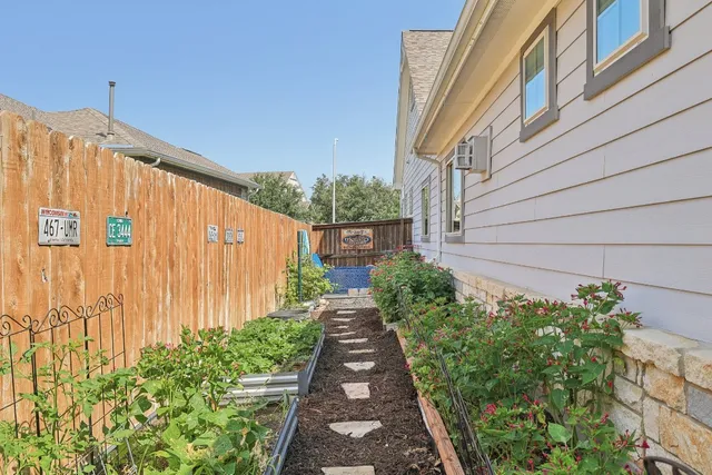 a view of a pathway with a building in the background