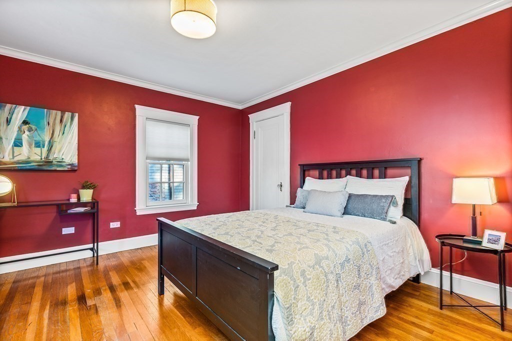 64 Devonshire Road Newton, MA 02468 - Photo 24 of 41 a bed room with a bed and a lamp