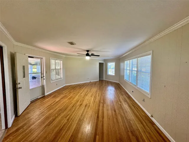 a house with swimming pool in front of it