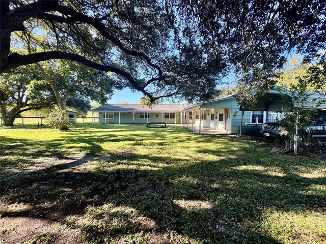 a view of balcony with furniture