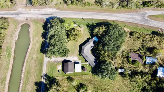 a view of swimming pool with a yard