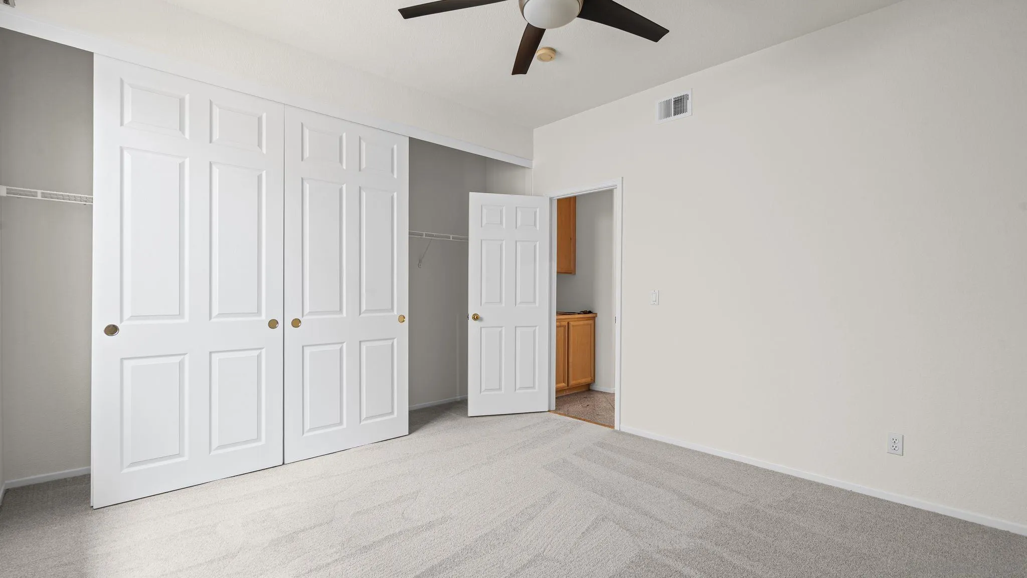 1783 Medinah Road San Marcos, CA 92069 - Photo 26 of 39 an empty room with a ceiling fan