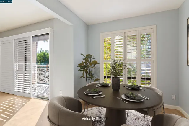 a living room with furniture rug and window