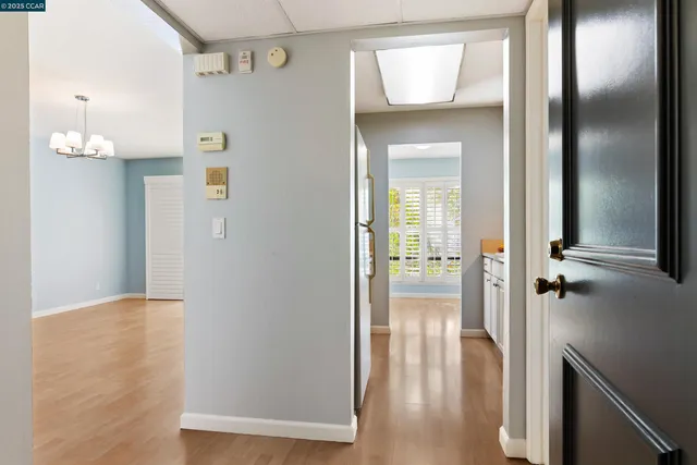 a view of an empty room with a window