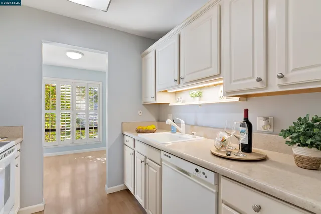 a view of a chairs and table in the patio