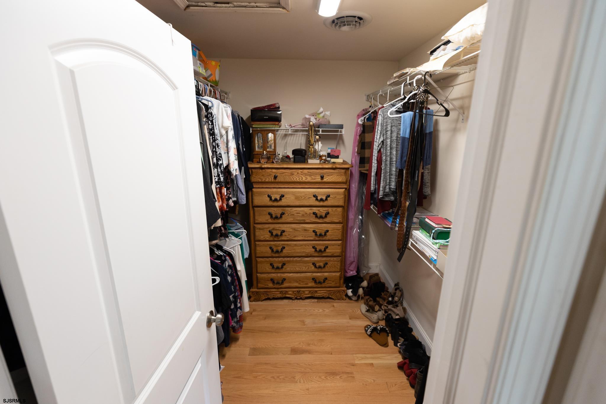 336 Old New York Road Port Republic, NJ 08241 - Photo 24 of 42 a view of walk in closet with clothes and shoes