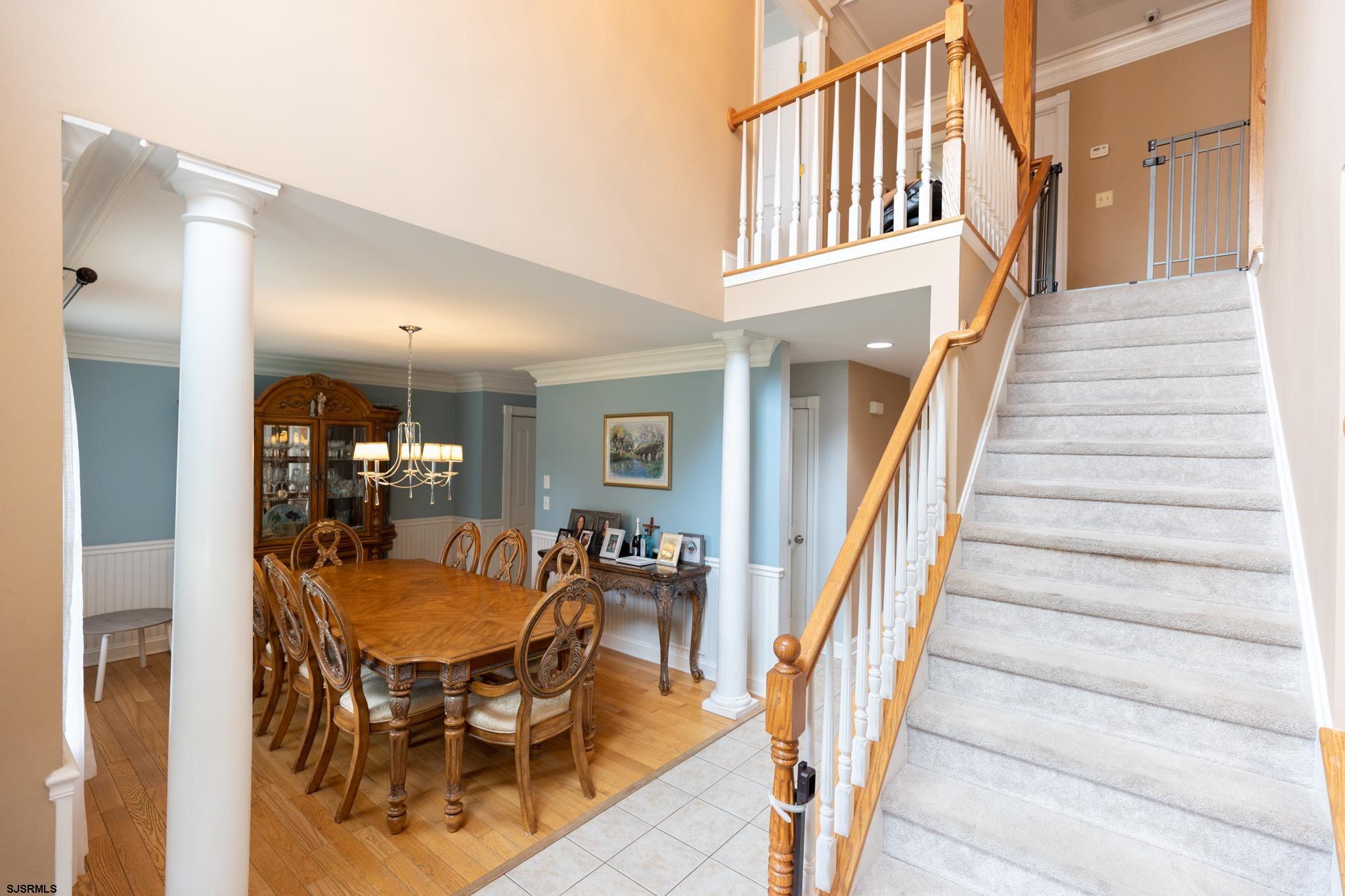 336 Old New York Road Port Republic, NJ 08241 - Photo 3 of 42 a view of a dining room with furniture and a chandelier