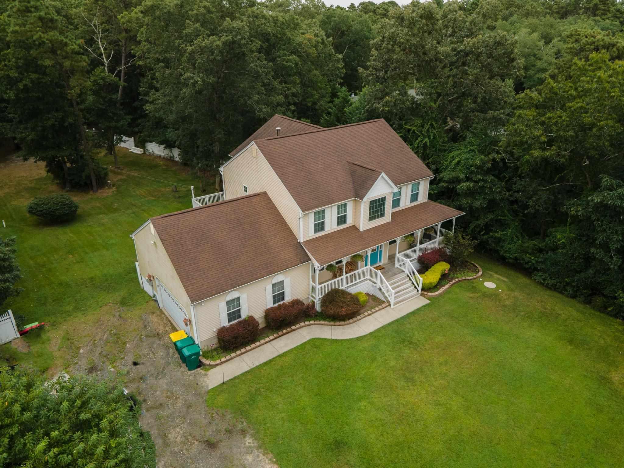 336 Old New York Road Port Republic, NJ 08241 - Photo 37 of 42 an aerial view of a house with garden space and trees all around