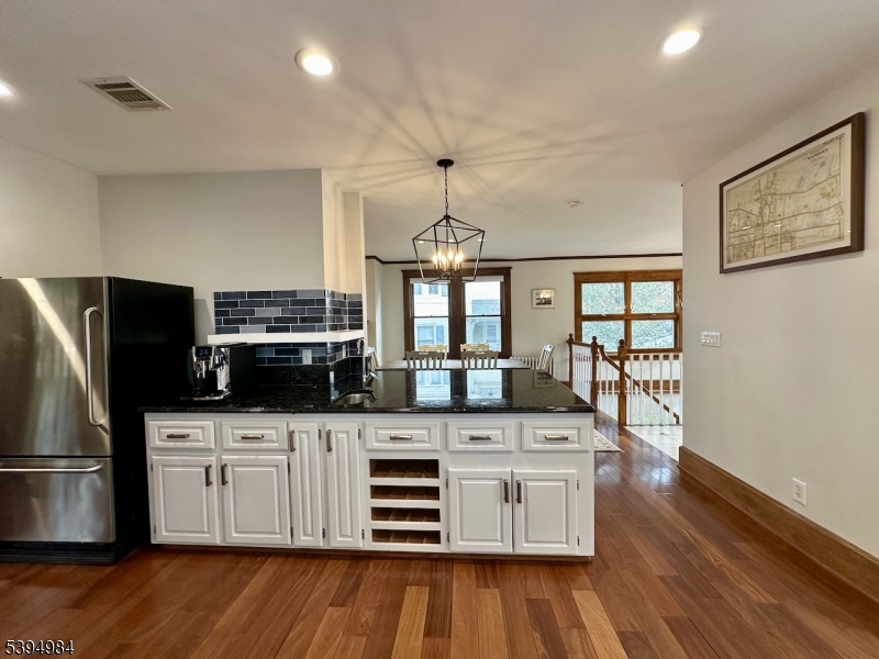 12 Maple Avenue Madison, NJ 07940 - Photo 12 of 39 a kitchen with stainless steel appliances a stove refrigerator and cabinets