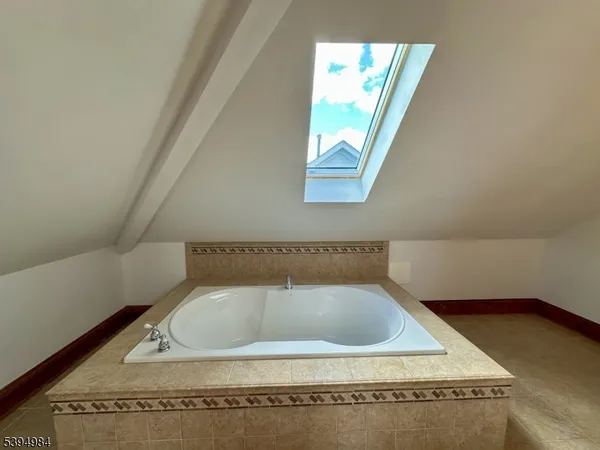 view of a bath tub sitting in a bathroom