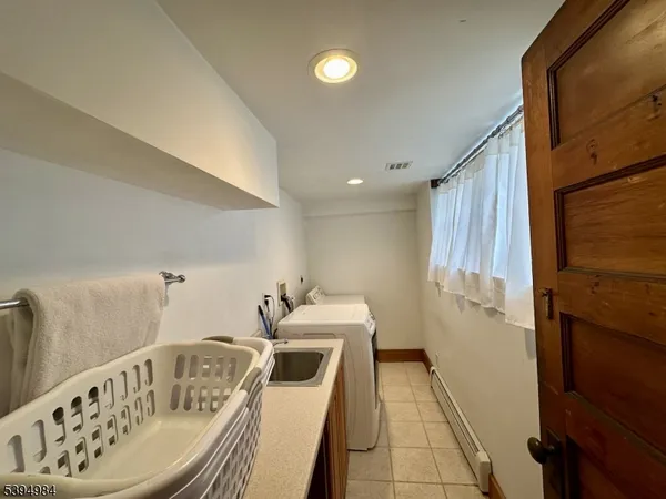 a bathroom with a bathtub sink and toilet