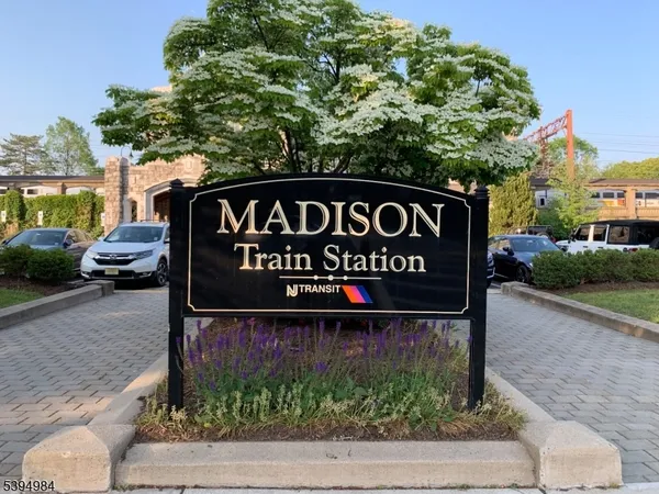 a sign broad in front of the house