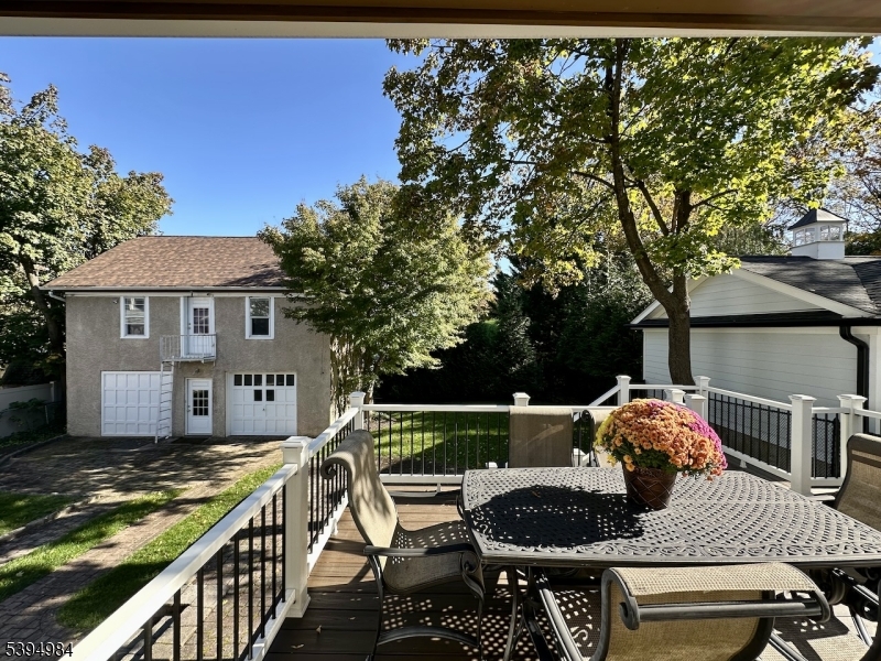 12 Maple Avenue Madison, NJ 07940 - Photo 5 of 39 a house view with a sitting space and garden space