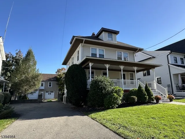 a view of livingroom with furniture and hardwood floor