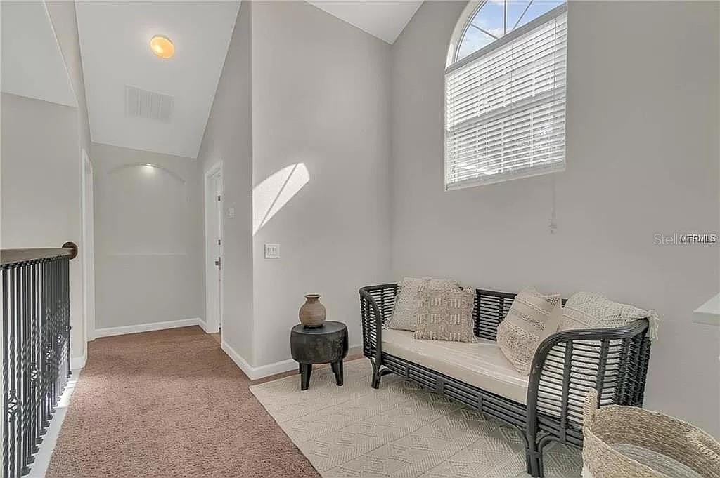 5526 Tiny Road Winter Garden, FL 34787 - Photo 19 of 39 a living room with furniture and a potted plant